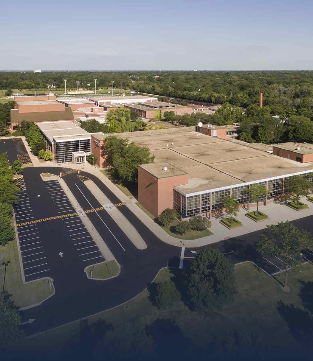 Aerial view of a school and parking lot