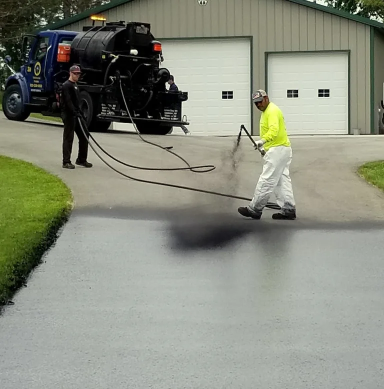 asphalt seal & repair employees working