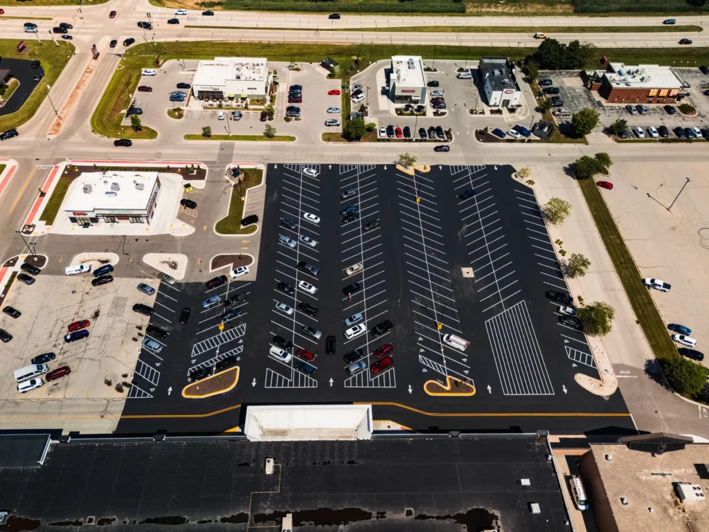 Aerial view of parking lot after asphalt paving work