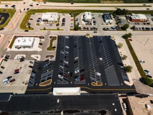 Aerial view of parking lot after asphalt paving work
