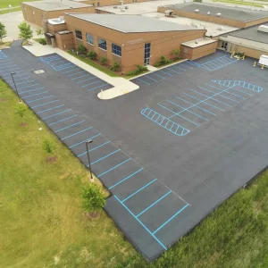 after photo of a parking lot paved by asphalt seal and repair