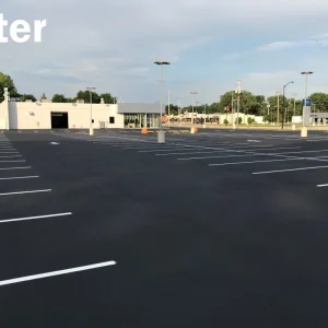 after photo of a parking lot paved by asphalt seal and repair