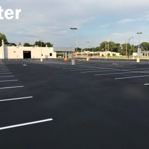 after picture of a parking lot completed by asphalt seal & repair in green bay, wi