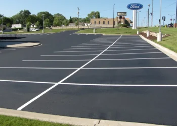 white parking lot spots for a ford dealership