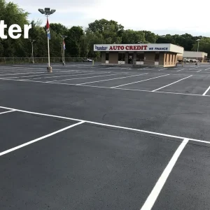 after picture of a newly repaired parking lot by asphalt seal & repair