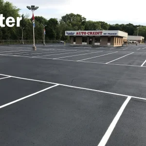 after picture of a newly repaired parking lot by asphalt seal & repair