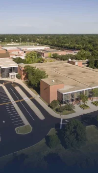 Aerial view of a school and parking lot