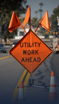 utility_contractors orange utility work ahead sign